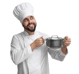 Photo of Happy young chef in uniform holding cooking pot on white background