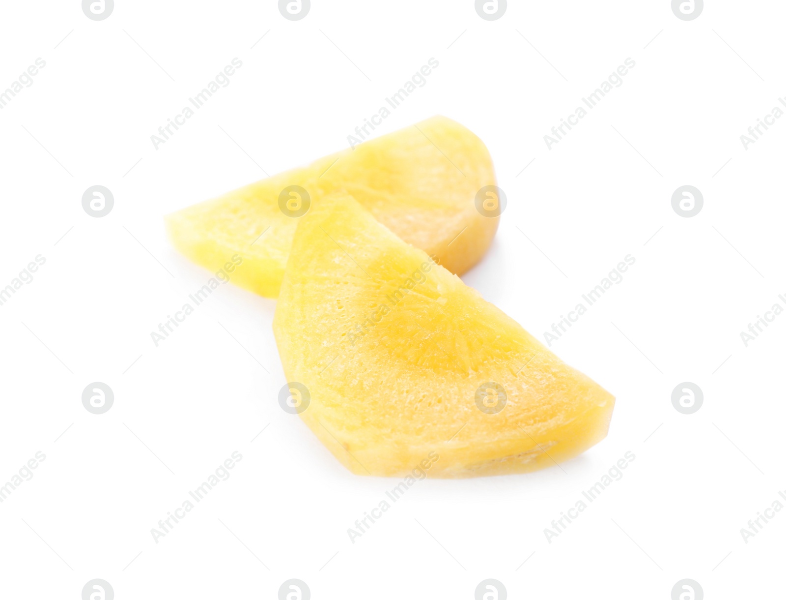 Photo of Slices of raw yellow carrot isolated on white