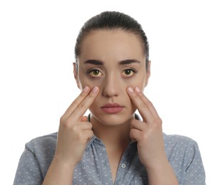 Photo of Woman checking her health condition on white background. Yellow eyes as symptom of problems with liver