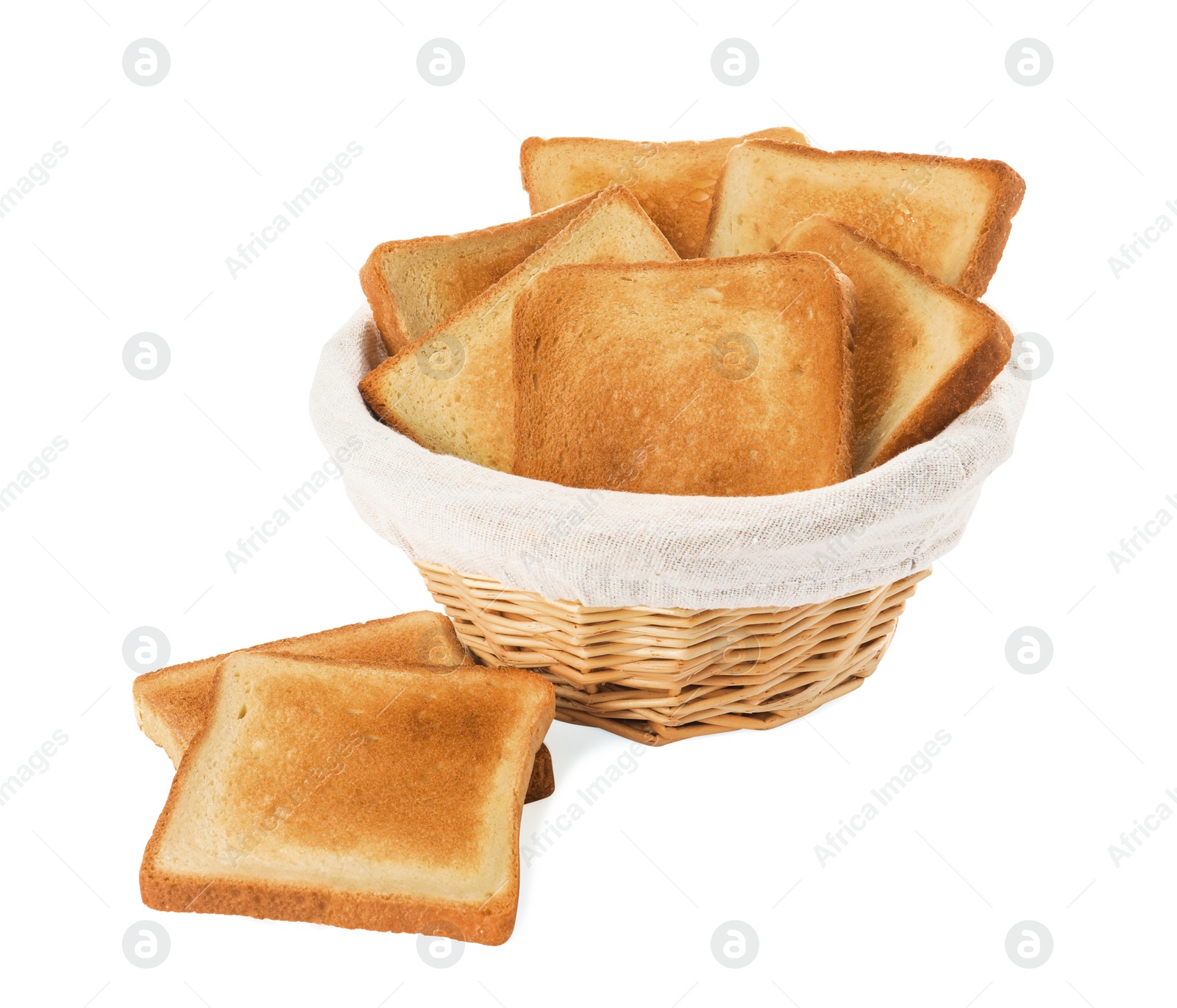 Photo of Wicker basket with slices of delicious toasted bread on white background