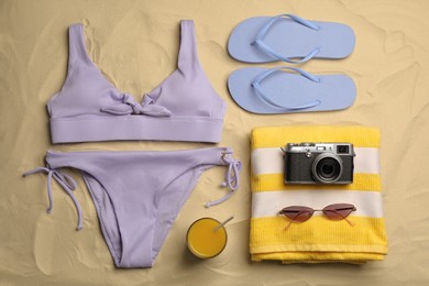 Photo of Flat lay composition with beach objects on sand