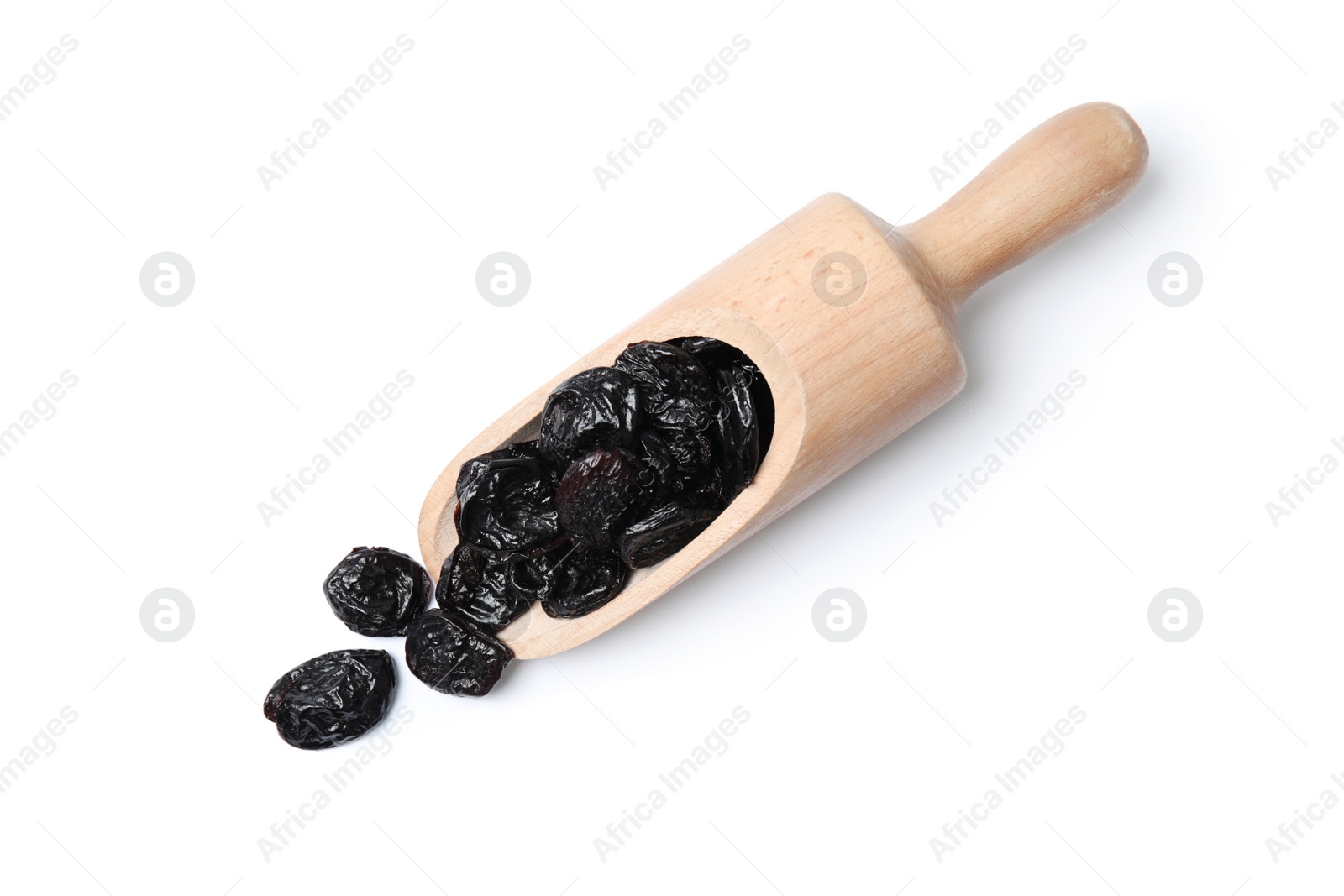 Photo of Scoop of dried plums on white background, top view. Healthy fruit