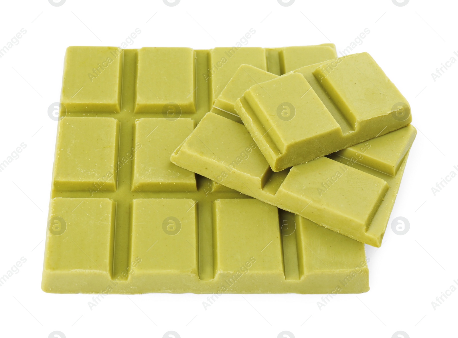 Photo of Pieces of tasty matcha chocolate bar isolated on white