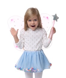 Photo of Emotional little girl in fairy costume with pink wings and magic wand on white background