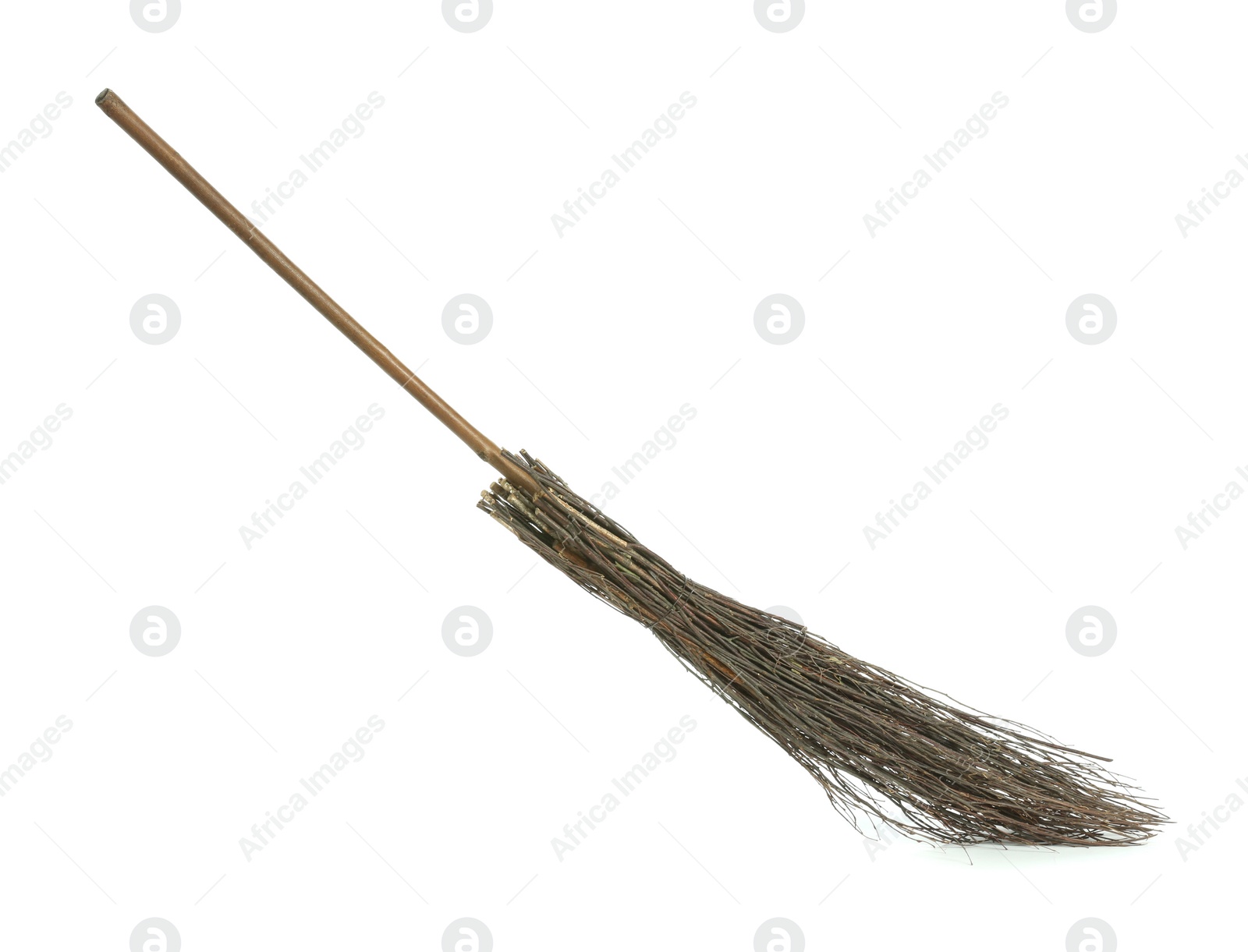 Photo of Old broom with wooden handle isolated on white