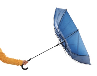 Photo of Woman with umbrella caught in gust of wind on white background, closeup