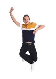 Photo of Handsome teenage boy jumping on white background