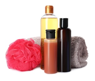 Photo of Personal hygiene products with towel and shower puff on white background