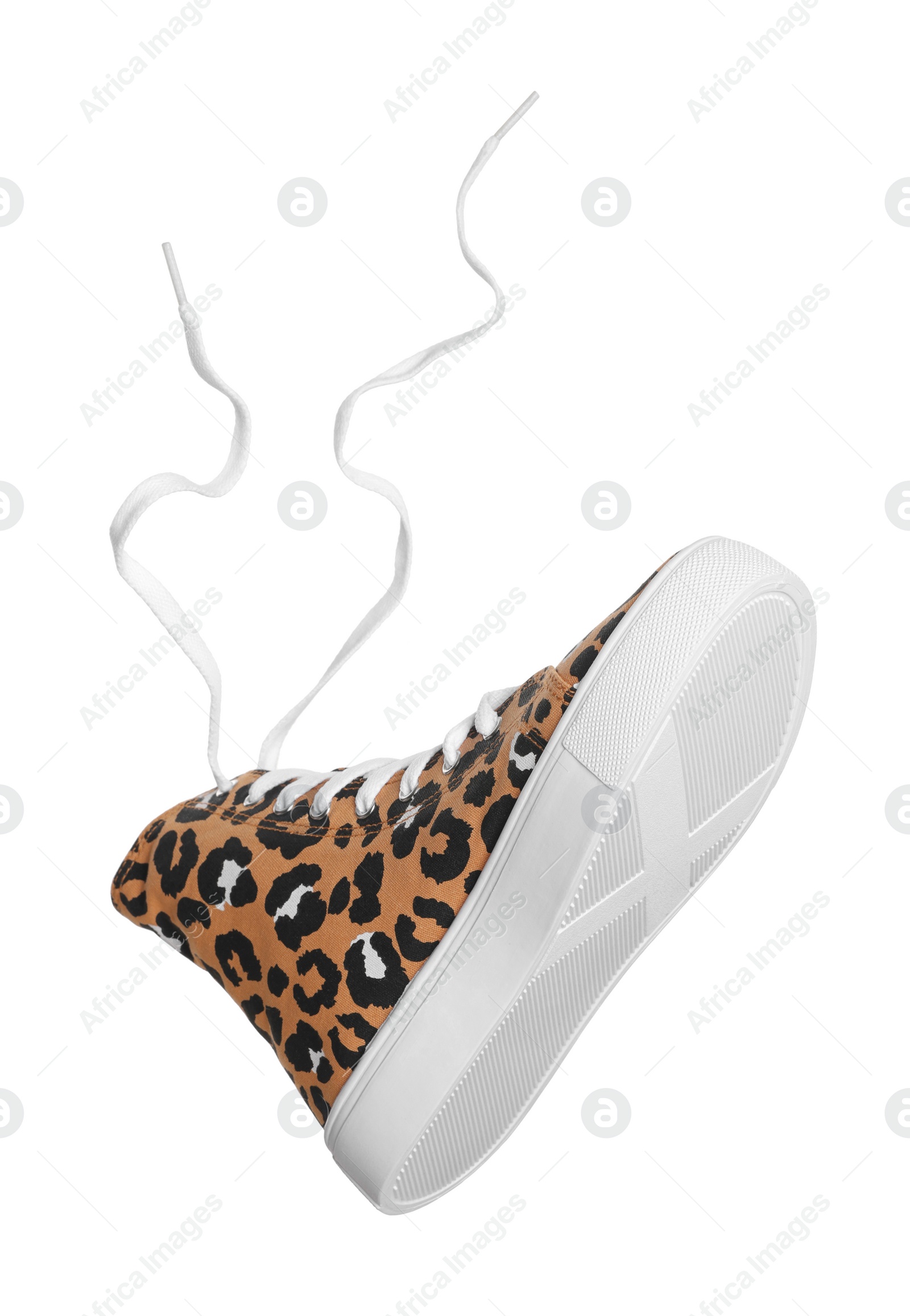 Photo of One classic old school sneaker isolated on white