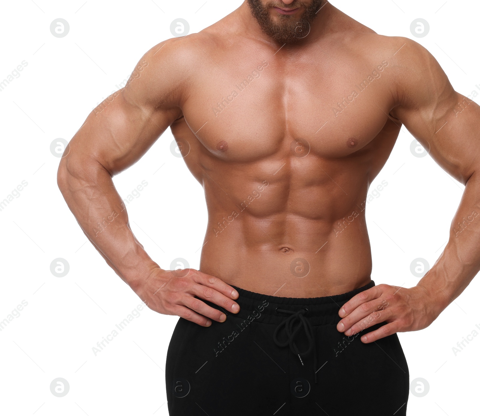 Photo of Young bodybuilder with muscular body on white background, closeup