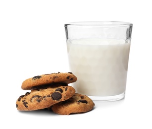 Tasty cookies with chocolate chips and glass of milk on white background