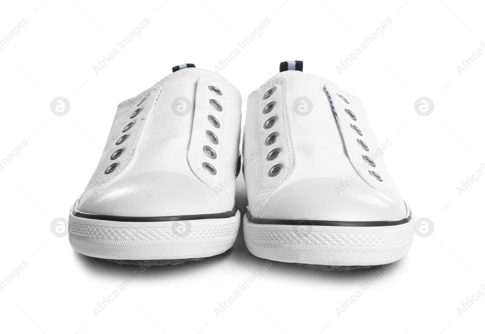 Photo of Pair of stylish sneakers on white background