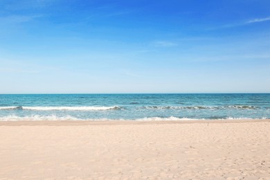 Photo of Picturesque view of beautiful sea and sandy beach on sunny day