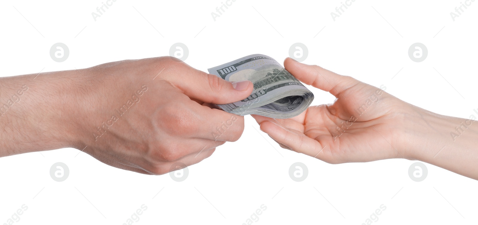 Photo of Money exchange. Man giving dollar banknotes to woman on white background, closeup