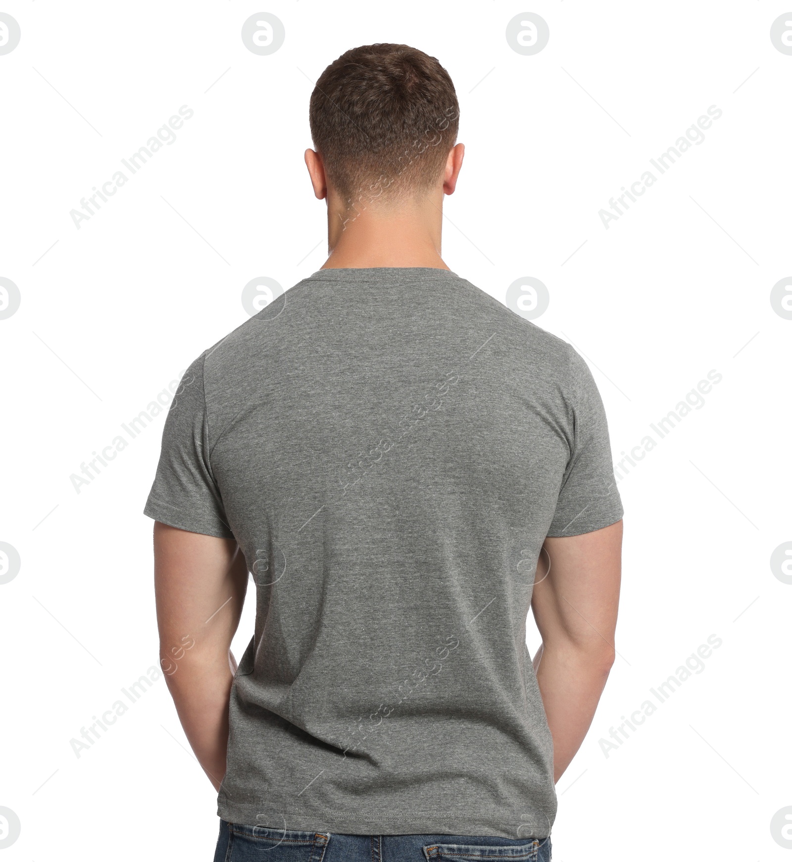 Photo of Man wearing grey t-shirt on white background, back view. Mockup for design