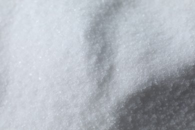 Photo of Organic white sea salt as background, above view