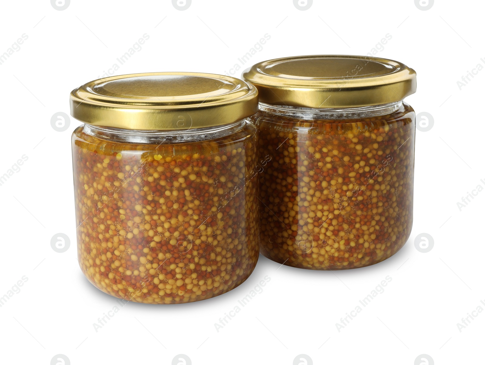 Photo of Fresh whole grain mustard in jars isolated on white