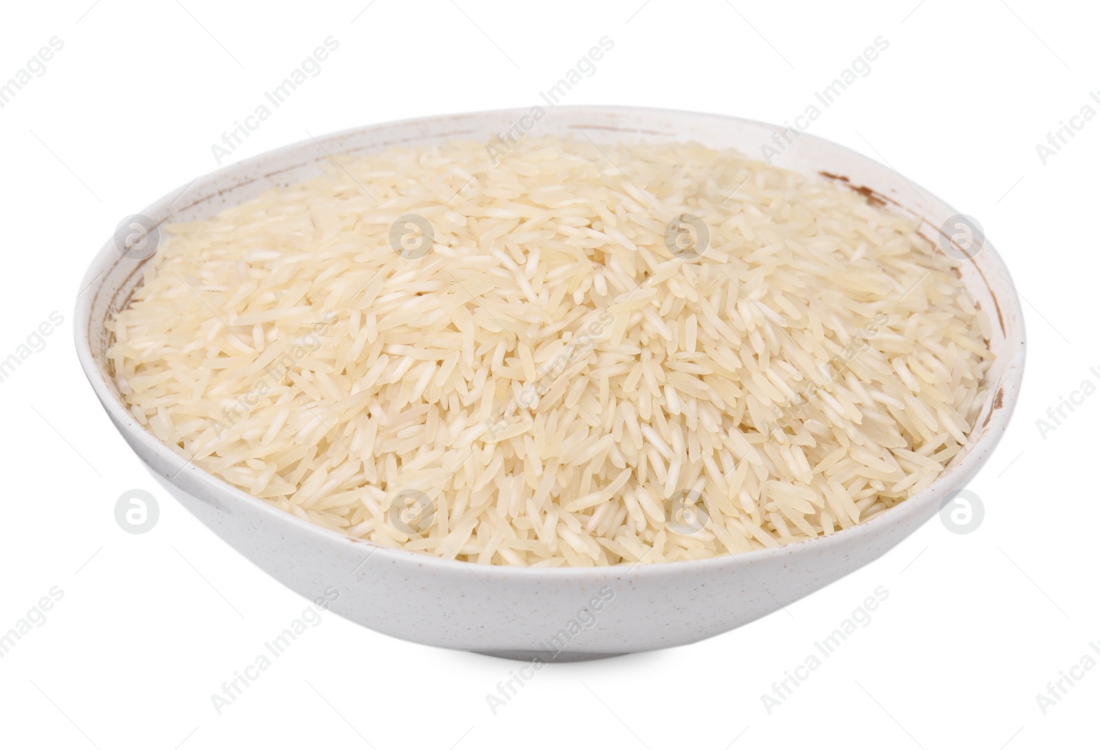 Photo of Raw rice in bowl isolated on white