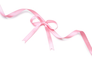 Photo of Pink satin ribbon with bow isolated on white, top view