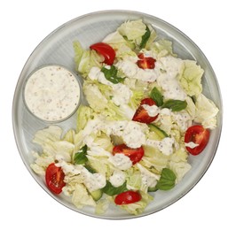 Photo of Delicious salad with Chinese cabbage, tomatoes, cucumber and dressing isolated on white, top view