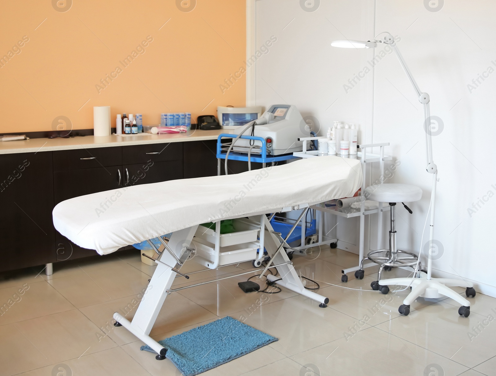 Photo of Office with massage table and equipment. Professional epilation