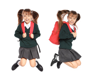 Girl in school uniform jumping on white background