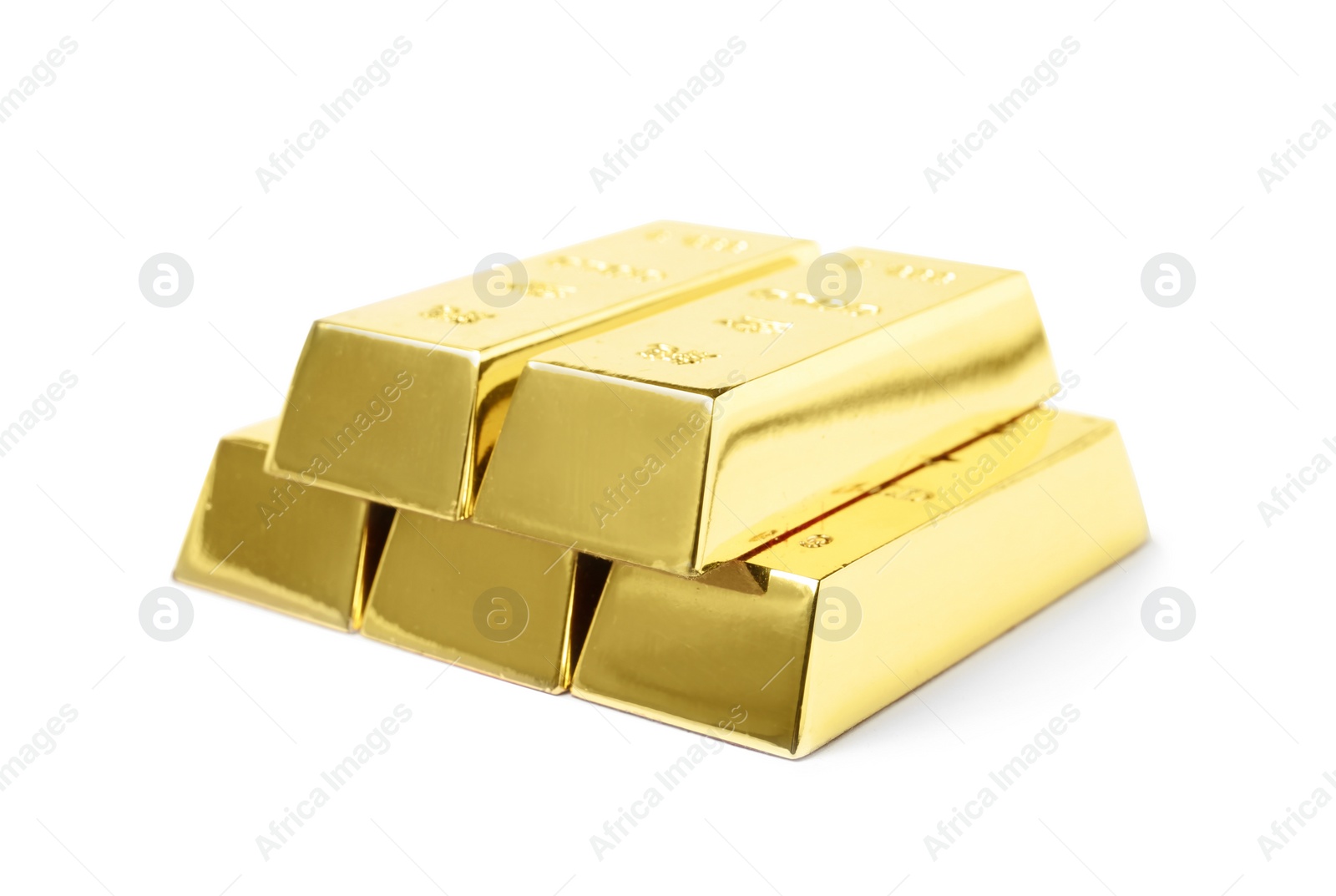 Photo of Stack of shining gold bars isolated on white