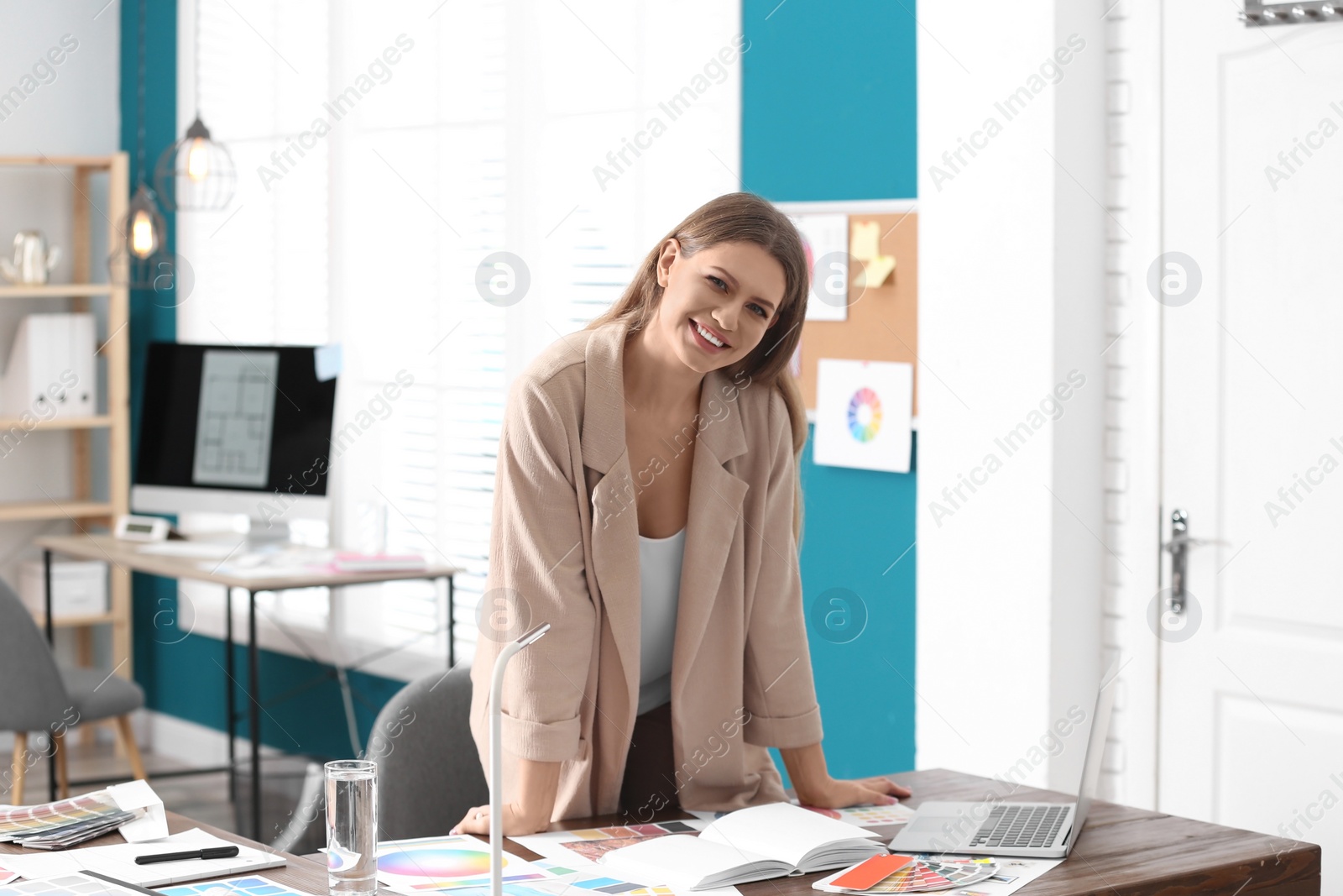 Photo of Professional interior designer at workplace in office