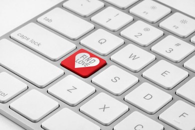 Image of Online dating. Red button with words Find Love on computer keyboard, closeup