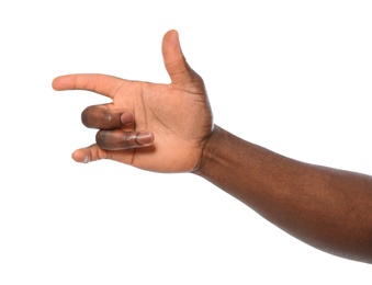 African-American man showing hand gesture on white background, closeup