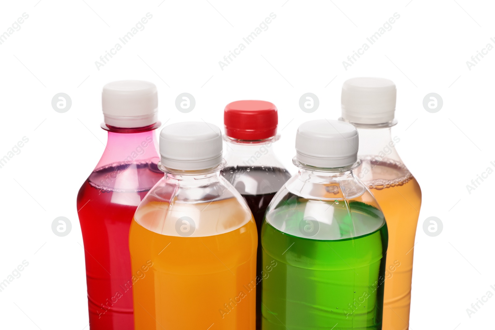 Photo of Bottles of soft drinks on white background, closeup