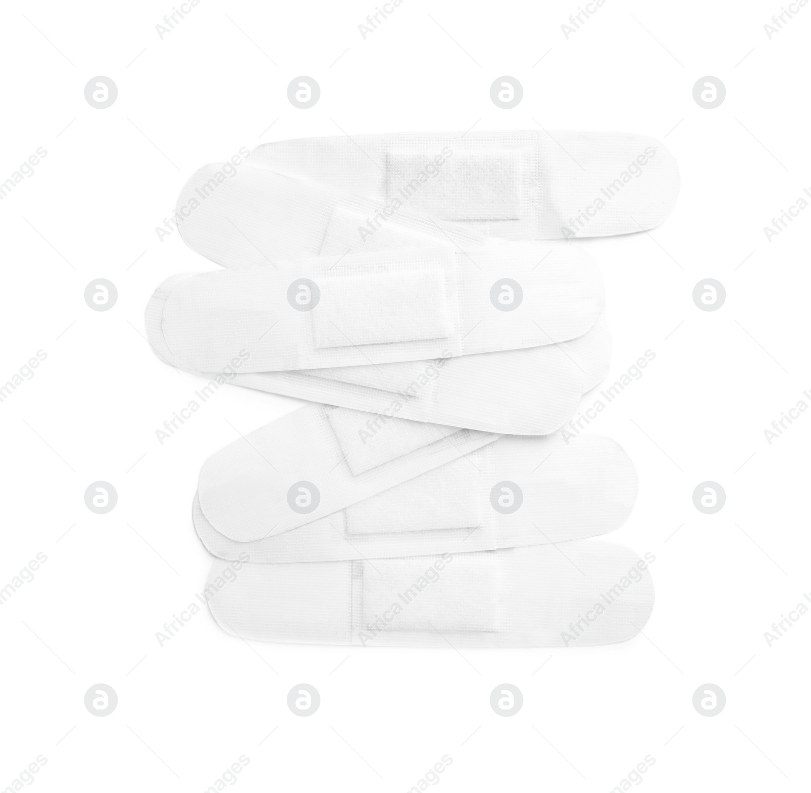 Medical sticking plasters isolated on white. First aid item Photo of Medical sticking plasters isolated on white. First aid item