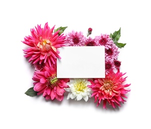 Flat lay composition with beautiful dahlia flowers and blank card on white background