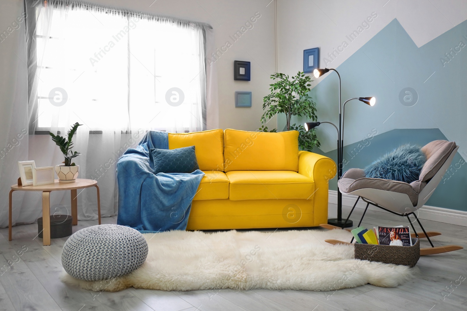 Photo of Stylish living room interior with comfortable sofa