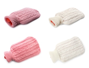 Set of hot water bottles with knitted covers on white background 
