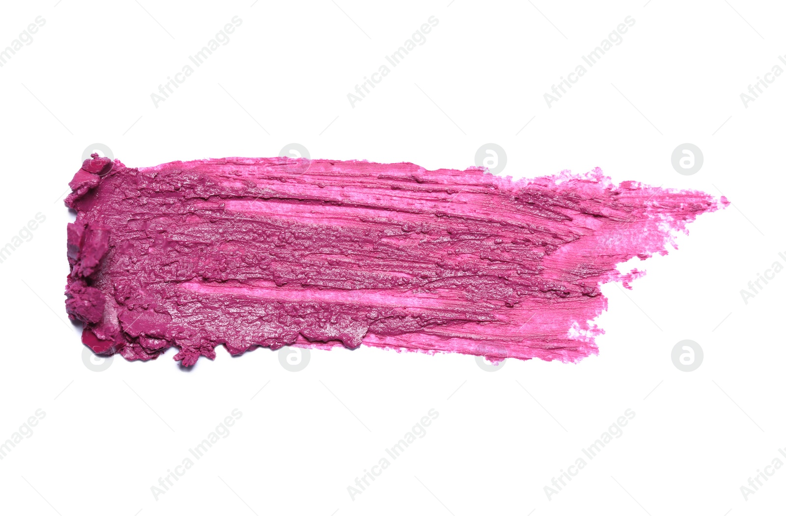 Photo of Smear of bright lipstick on white background, top view