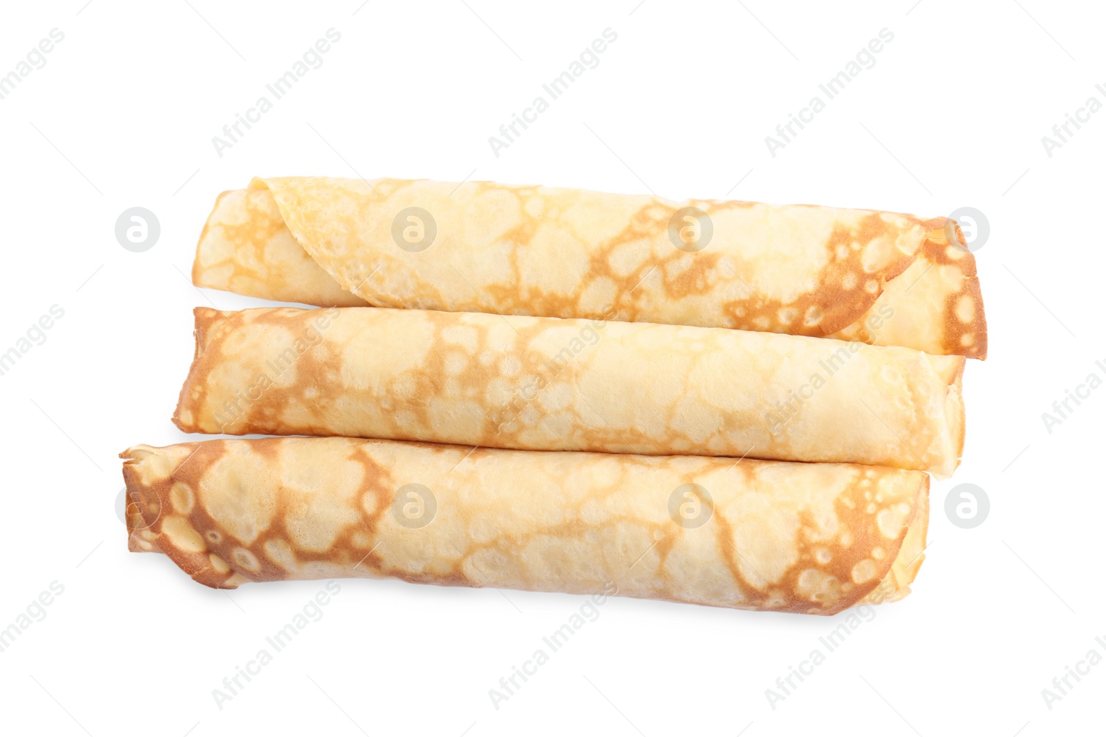 Photo of Rolled fresh thin pancakes isolated on white, top view