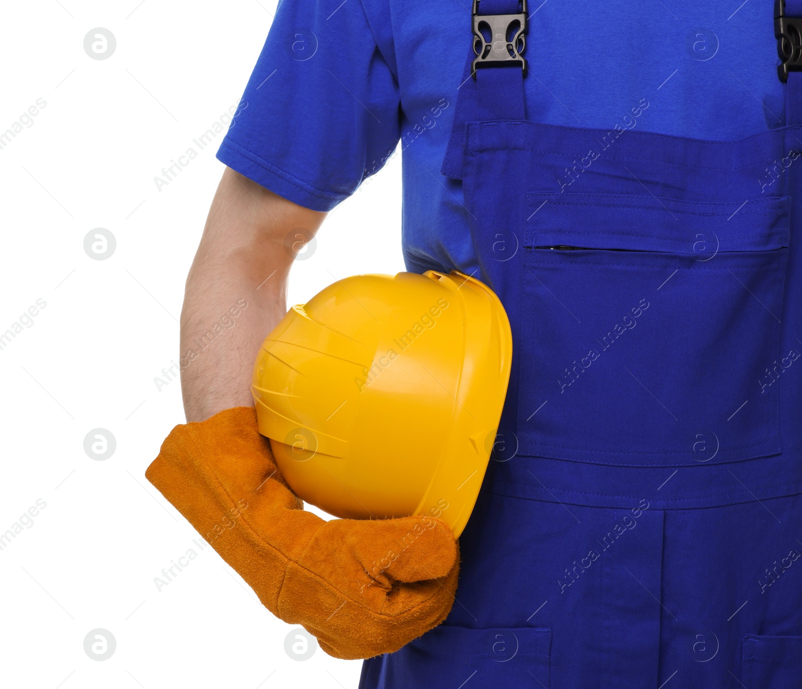 Photo of Young man holding yellow hardhat on white background, closeup. Safety equipment