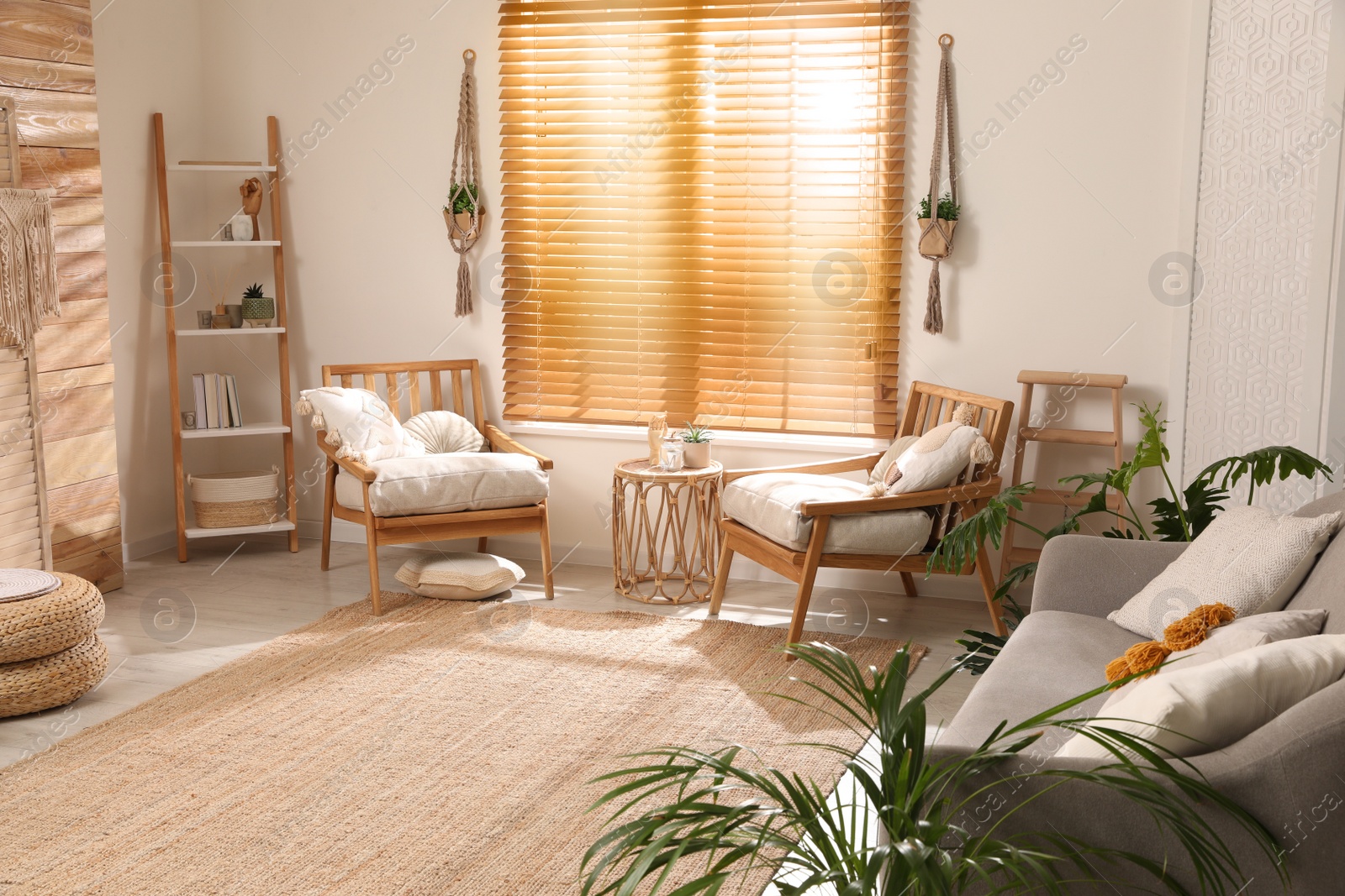 Photo of Stylish living room interior with wooden furniture and beautiful houseplants