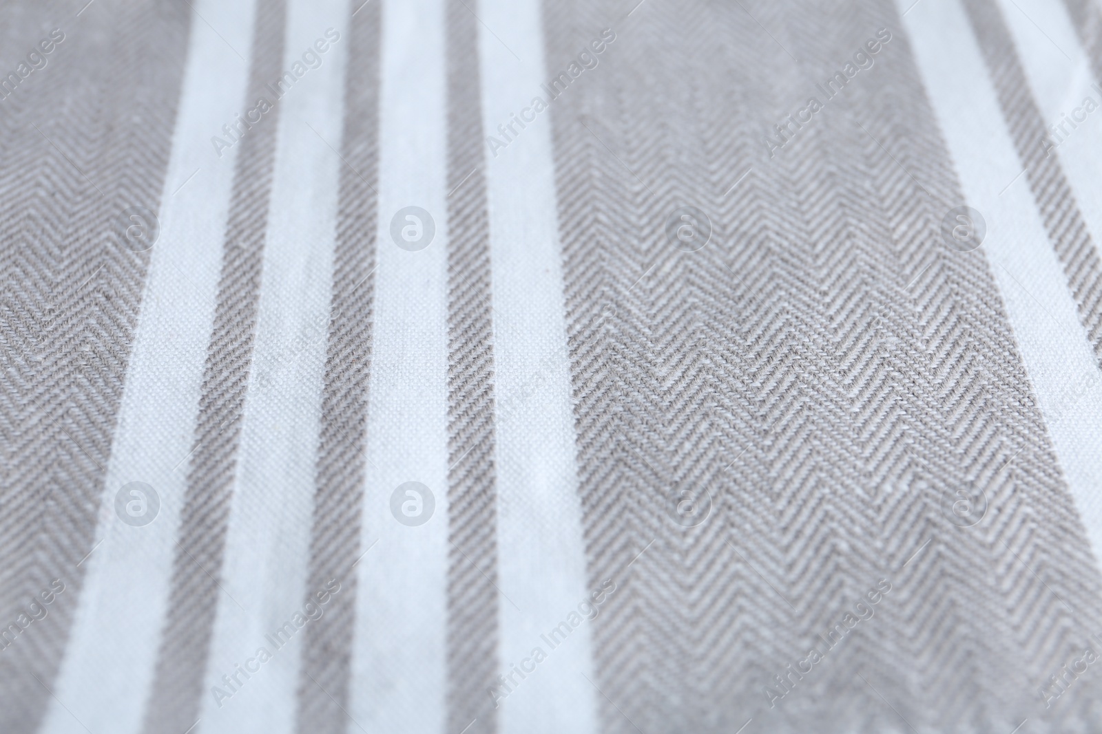 Photo of Texture of grey striped fabric as background, closeup