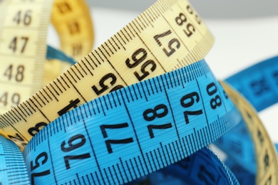 Different measuring tapes, closeup