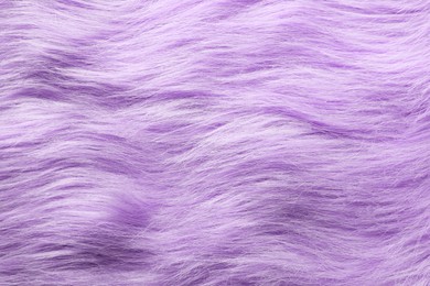 Texture of purple faux fur as background, closeup