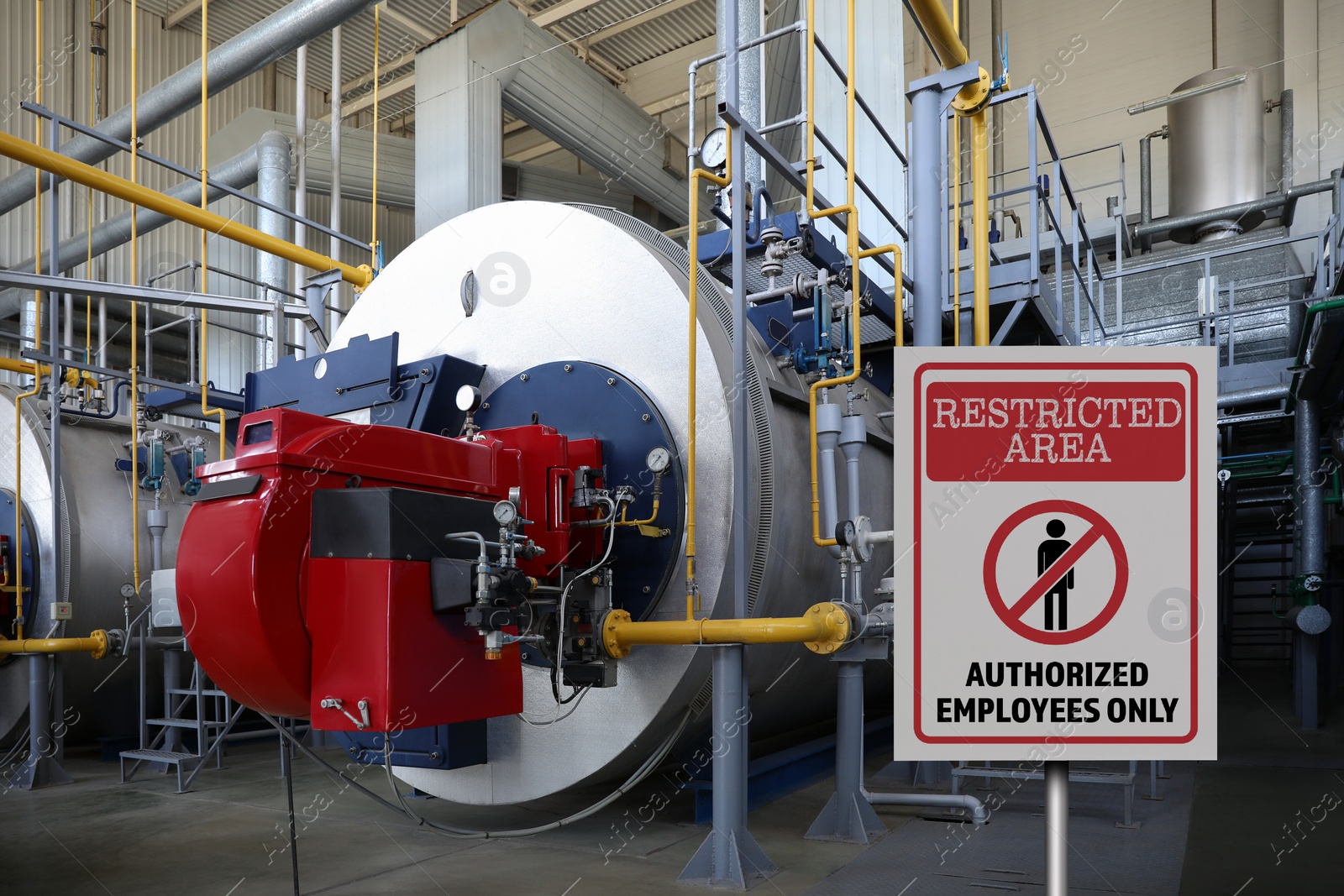 Image of Sign with text Restricted Area Authorized Employees Only near different equipment indoors