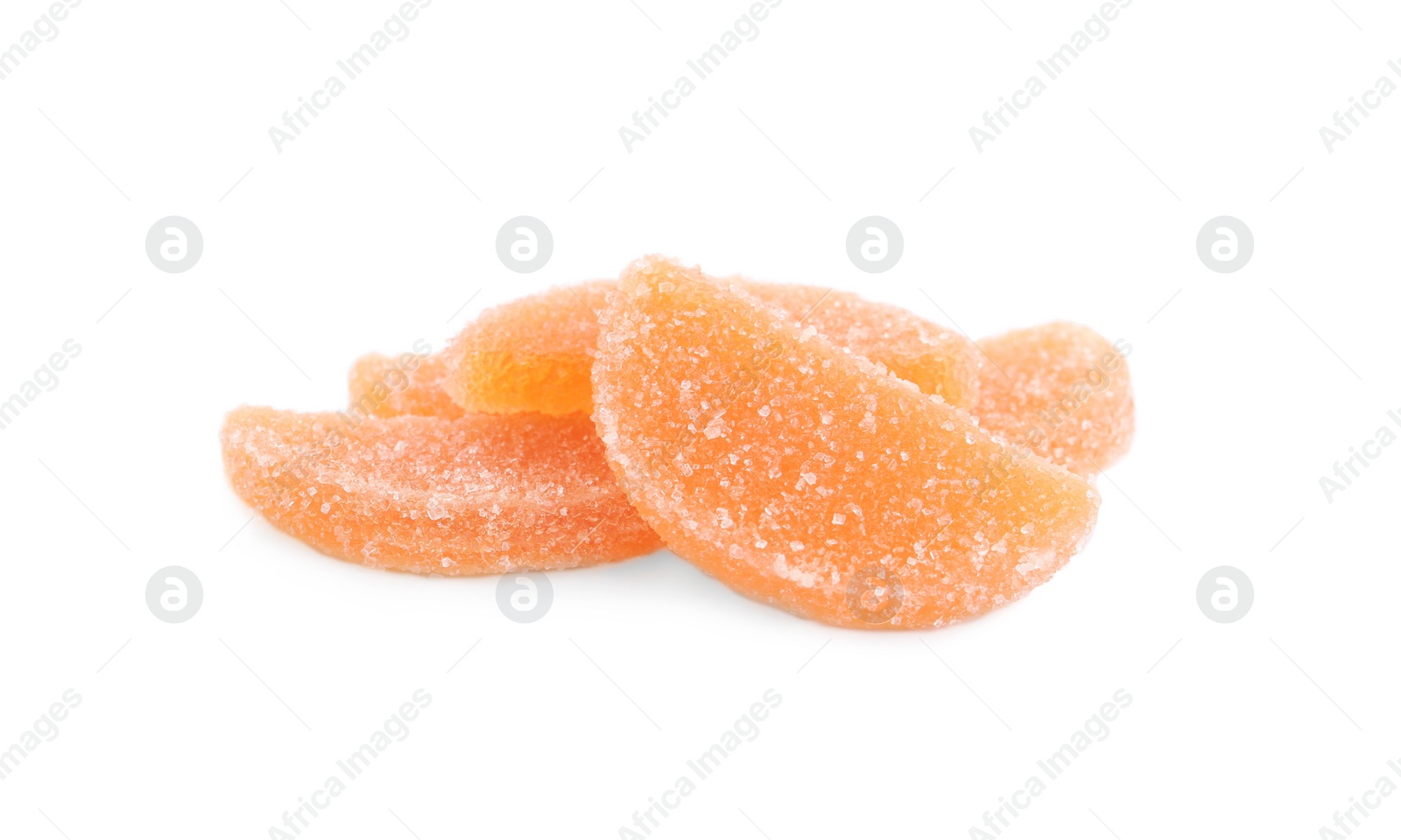 Photo of Sweet orange jelly candies on white background