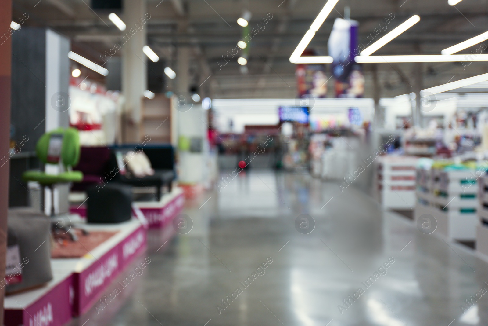 Photo of Blurred view of shopping mall interior. Bokeh effect