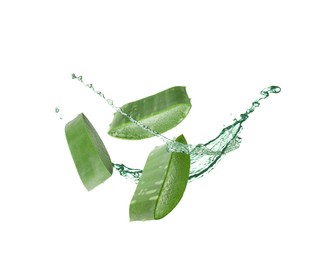 Sliced aloe vera leaf and splash of juice on white background