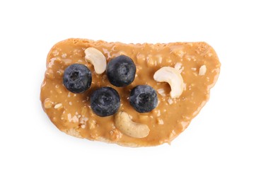 Photo of Toast with tasty nut butter, blueberries and cashews isolated on white, top view