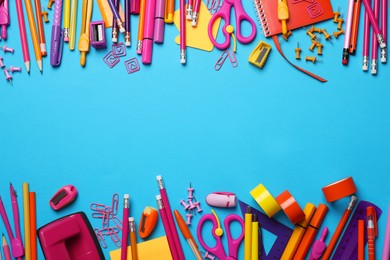 Photo of Flat lay composition with different stationery on light blue background, space for text