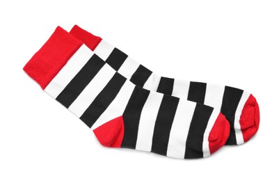 Photo of Pair of striped socks on white background, top view