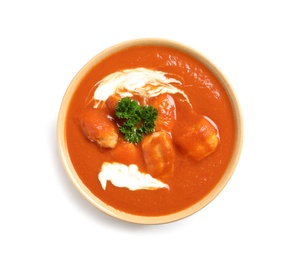 Photo of Bowl of delicious butter chicken on white background, top view. Traditional indian Murgh Makhani